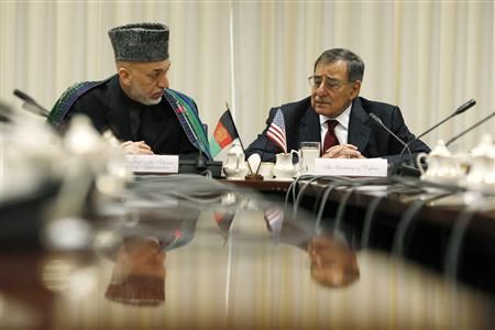 Hamid Karzai and U.S. Defense Secretary Leon Panetta discuss the “last chapter” in war