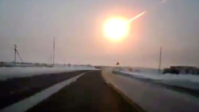 In this frame grab made from a video done with a dashboard camera, on a highway from Kostanai, Kazakhstan, to Chelyabinsk region, Russia, Feb. 15, 2013 a meteorite contrail is seen.