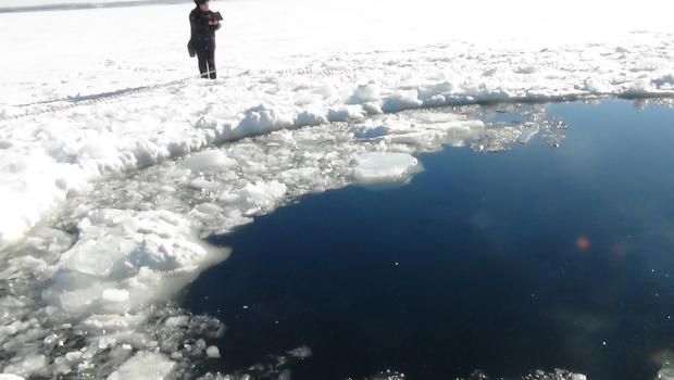 A circular hole in the ice of Chebarkul Lake where a meteor reportedly struck the lake near Chelyabinsk, about 930 miles east of Moscow, Russia, Friday, Feb. 15, 2013. Photo: Chelyabinsk Regional Branch of Russian Interior Ministry (AP)