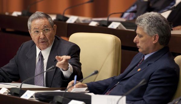 Cuba's new First Vice-President Miguel Diaz-Canel (right), listens to Cuban President Raul Castroduring the closing session of the National Assembly in Havana, on Sunday. 