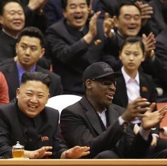North Korean leader Kim Jong Un and former NBA star Dennis Rodman watch North Korean and US players at an arena in Pyongyang (AP)