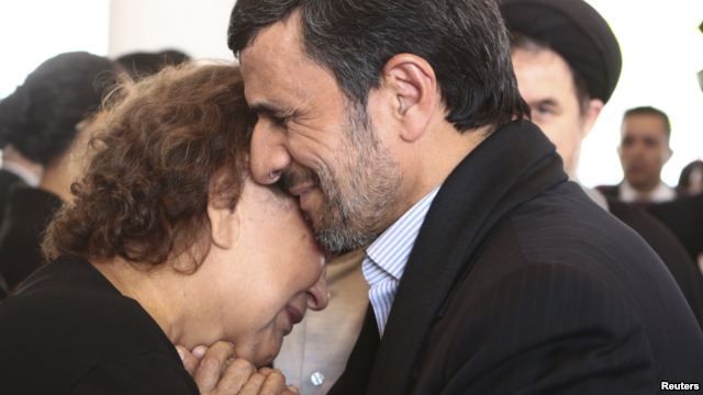 Iranian President Mahmud Ahmadinejad offers his condolences to Elena Frias, mother of Venezuela's late President Hugo Chavez, during the funeral service at the Military Academy in Caracas on March 8. The photo was released to the media by the press office of the Venezuelan presidency.
