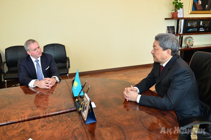 Scott Davis of Chevron (left) meeting governor Izmukhambetov