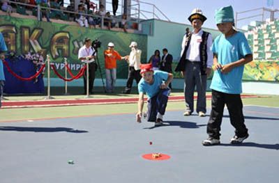 Asyk — is a bone which is a part of a knee joint of a sheep. Up till now asyks game is one of the most popular games among the Kazakh people. It develops good eyesight and skillfulness. There are many different types of this game: “Alsha”, “Tagan”, “Krug” and “Shik-Buk”. The largest asyks were used as a cue ball, which is called “saka”. If the player has a good ’saka’ there is a big chance to win the game.   Sometimes in the old days the sultan and khans’ children asyks were filled with gold. And the phrase: “Asygynin alshysynan tussin!” which means “Let your asyk be an alsha” is said when people want to wish good luck.