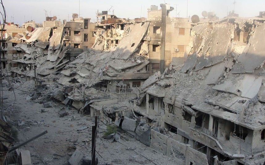 The remnants of buildings slope downwards in the city of Homs after being shelled during fierce fighting between Syrian government troops and opposition forces. AFP