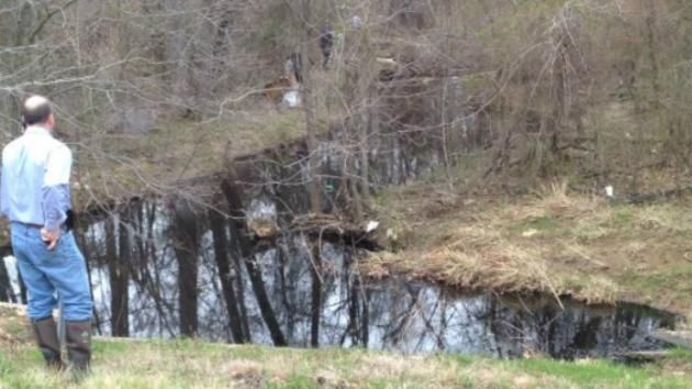 A river of Canadian crude slithers near an Arkansas subdivision after Exxon's Pegasus pipeline ruptures and spills about 10,000 barrels of oil. Courtesy of KATV