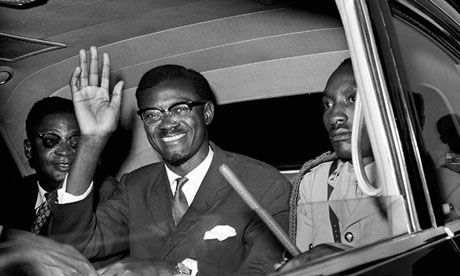 Congo premier Patrice Lumumba waves in New York in July 1960 after his arrival from Europe. Photograph: AP