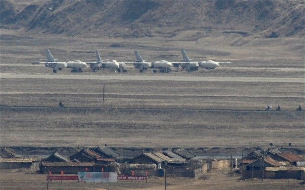 North Korean Harbin H-5 bomber jets at Uiju Airfield near the North Korean town of Sinuiju, opposite the Chinese border city of Dandong Photo: REUTERS/Jacky Chen