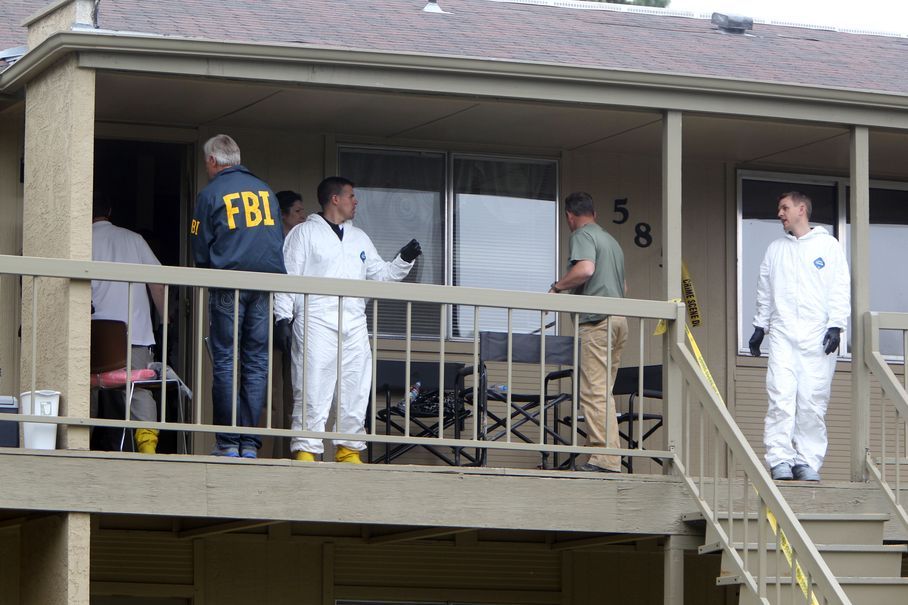 Federal authorities search an apartment in Boise, Idaho on Cassia Drive on Thursday afternoon, May 16 2013. U.S. authorities in Idaho said they have arrested a man from Uzbekistan accused of conspiring with a designated terrorist organization in his home country and helping scheme to use a weapon of mass destruction. Fazliddin Kurbanov, 30, was arrested at an apartment complex 
