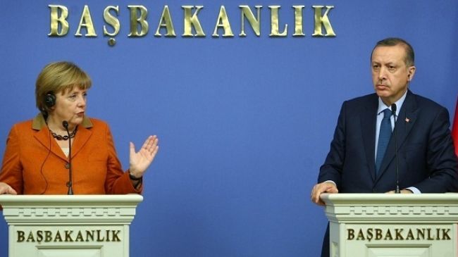 German Chancellor Angela Merkel (L) and Turkey's Prime Minister Tayyip Erdogan at a joint news conference in Ankara, Turkey on February 25, 2013
