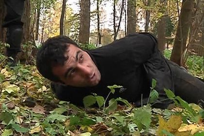 Police released a photo reportedly showing Orkhan Zeynalov, a suspect in a murder of Egor Sherbakov, being apprehended in Kolomna, in the Moscow region, on October 15.