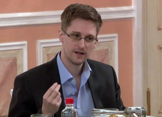  In this file image made from video released by WikiLeaks on Friday, Oct. 11, 2013, former National Security Agency systems analyst Edward Snowden speaks during a presentation ceremony for the Sam Adams Award in Moscow, Russia. In an interview with the New York Times posted to its website on Thursday, Oct. 17, 2013, Snowden says that he did not take any secret NSA documents to Russia