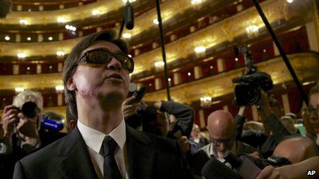 Artistic director of the Bolshoi ballet Sergei Filin, left, speaks to the media after a traditional annual meeting of the Bolshoi Theatre in Moscow, Russia, Tuesday, 17 Sept 2013 Sergei Filin has had more than 20 operations to try to save his eyesight