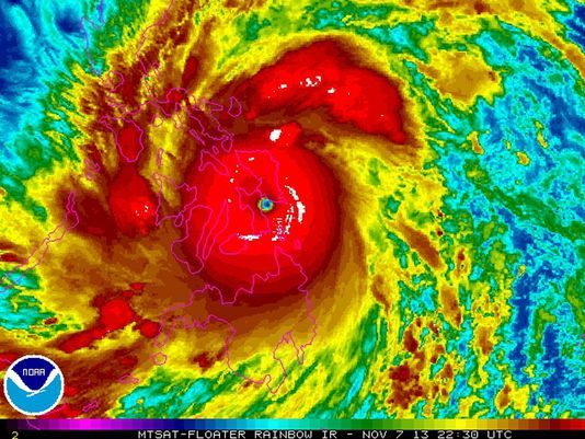 This Thursday, Nov. 7, 2013 satellite image provided by the National Oceanic and Atmospheric Administration shows Typhoon Haiyan over the Philippines. (Photo: Handout via AP)