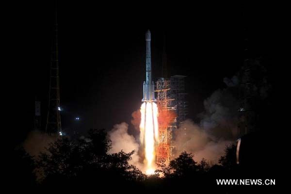 The Long March-3B carrier rocket carrying China's Chang'e-3 lunar probe blasts off from the launch pad at Xichang Satellite Launch Center, southwest China's Sichuan Province, Dec.2, 2013. It will be the first time for China to send a spacecraft to soft land on the surface of an extraterrestrial body, where it will conduct surveys on the moon. 