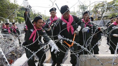 On Tuesday, police cut away wire and opened barricades to avoid further confrontation with anti-government protesters