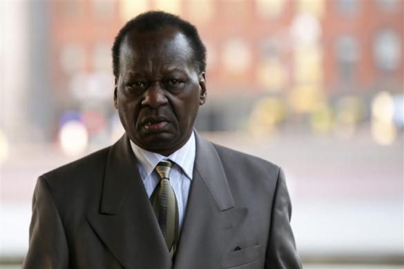 Onyango Obama, the uncle of U.S. President Barack Obama, arrives for a hearing at a federal immigration court in Boston, Massachusetts, December 3, 2013.