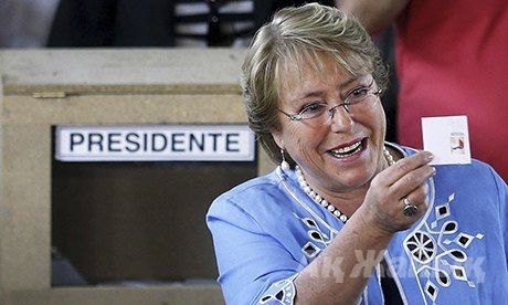 Michelle Bachelet after voting at a polling station in La Reina commune, near Santiago de Chile. Photograph: Felipe Trueba/EPA