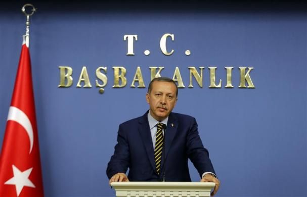 Turkey's Prime Minister Tayyip Erdogan addresses the media in Ankara December 25, 2013.