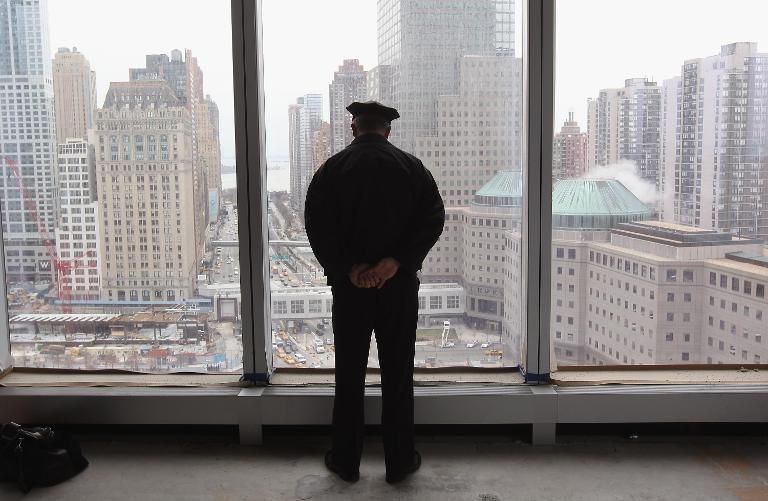 New York policeman overlooking Ground Zero.