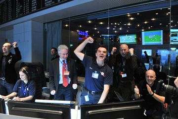 Rosetta mission scientists cheer as the comet-chasing probe's first signal after awaking from a 2.5-year sleep is received at the European Space Agency's Space Operations Center in Darmstadt, Germany on Jan. 20, 2014. Credit: ESA