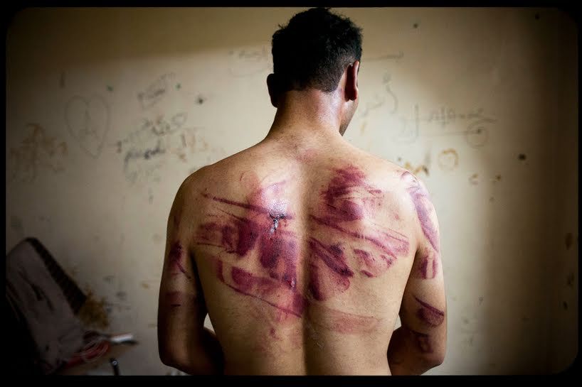 A Syrian military police photographer has supplied “clear evidence” showing the systematic torture and killing of about 11,000 detainees