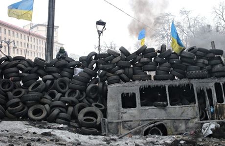A wall of tyres built by anti-government protesters in Kiev. Photograph: Itar-Tass/Barcroft Media