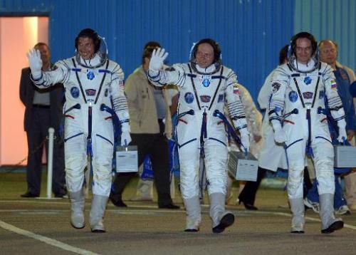 (L-R) US astronaut Michael Hopkins, Russian cosmonauts Oleg Kotov and Sergei Ryazansky at the Baikonur cosmodrome on September 25, 2013  Read more at: http://phys.org/news/2014-03-american-russians-earth-half-year-space.html#jCp
