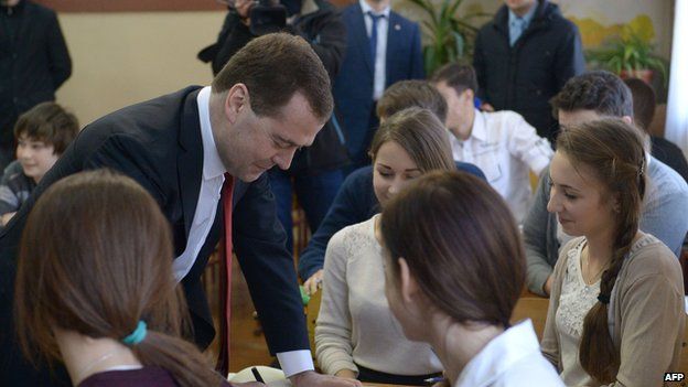 The Russian prime minister visited a school in Simferopol on Monday morning