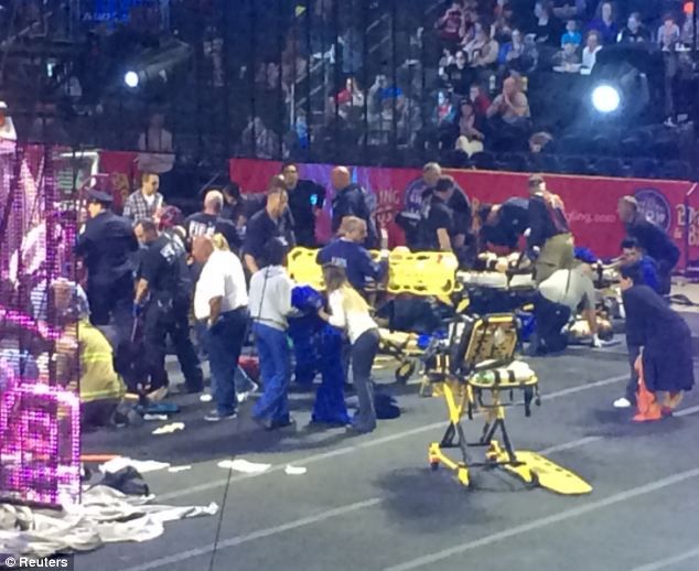 The moment circus platform collapsed and fell forty feet injuring 20 after acrobats were hanging by their HAIR.