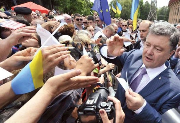 Ukrainian independent presidential candidate Petro Poroshenko, a billionaire member of parliament who has been a foreign and economic minister, is greeted by supporters during a campaign rally on May 17 in the industrial city of Kryvyi Rih in Dnipropetrovsk Oblast. 