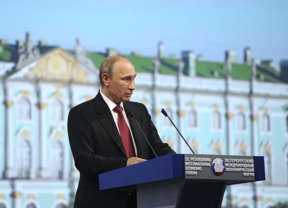 Russia's President Vladimir Putin speaks during a session of the St. Petersburg International Economic Forum 2014 (SPIEF 2014) in St. Petersburg May 23, 2014. (Reuters)