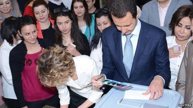 Syria's President Bashar al-Assad and his wife Asma cast their votes, 3 June President Assad himself voted in Damascus