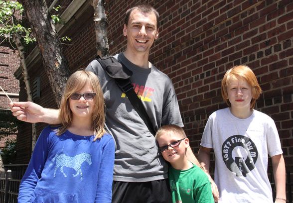 Th eQueens family attends the borough's 22nd annual Pride Parade.