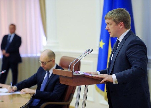 This handout photo taken and released on June 16, 2014 by the Prime Minister press-service shows Head of the Ukrainian Naftogaz state oil and gas firm Andriy Kobolev (R) speaking next to Ukrainian Prime Minister Arseniy Yatsenyuk (L) during a special hearing of the Cabinet ministers in Kiev. Ukraine said on June 16 that Russia had reduced its gas shipments and was only sending its neighbour enough to cover Europe's fuel needs after the two sides failed to reach a compromise price deal.