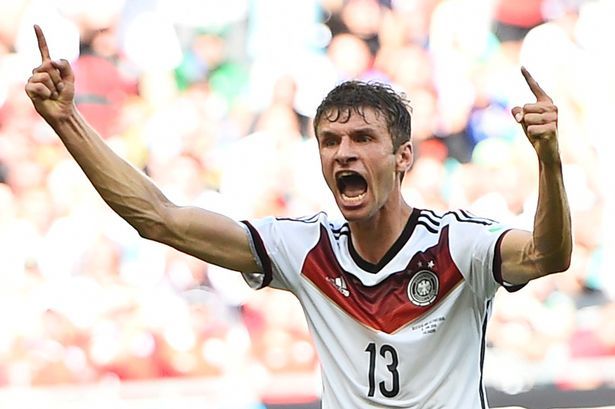 Germany's Thomas Muller celebrates scoring his team's third goal.