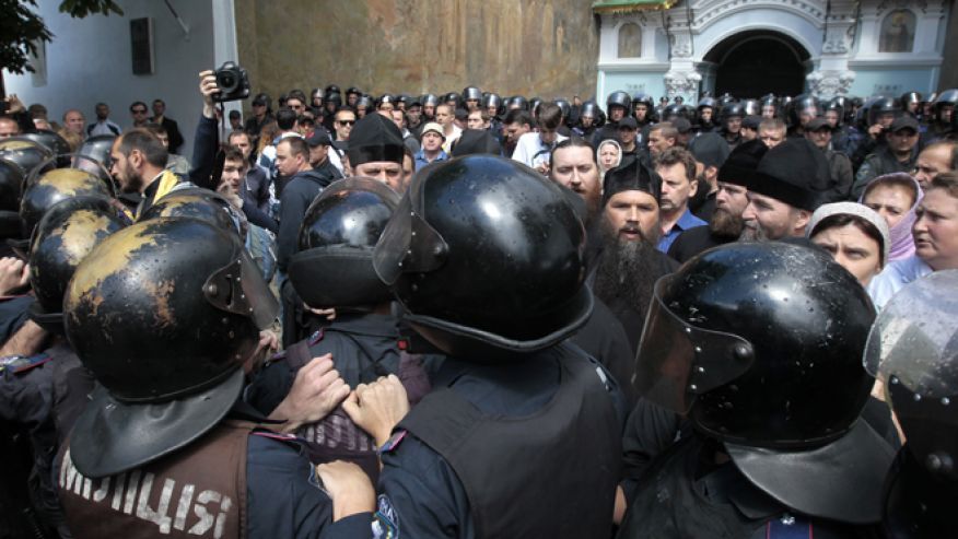 June 22, 2014: Riot police surround the Kiev Pechersk Lavra, an Orthodox Christian monastery, where radical masked activists gather to protest against separatists, who congregate in the area around the Kiev Pechersk Lavra.AP