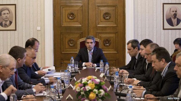 President Plevneliev (centre) said he would name a caretaker cabinet in August