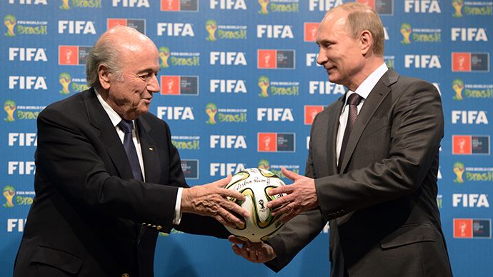 Russian President Vladimir Putin, right, and FIFA president Joseph Blatter during the official ceremony of handing over the 2018 World Cup signed certificate to Russia, July 13, 2014. (RIA Novosti)