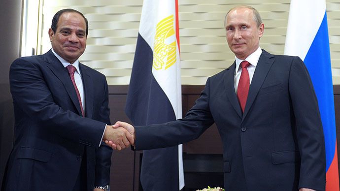Russian President Vladimir Putin (R) shakes hands with his Egyptian counterpart Abdel Fattah al-Sisi (L) during their meeting at the Bocharov Ruchei residence in Sochi on August 12, 2014 during the Egyptian leader's first official visit to Russia. (AFP Photo