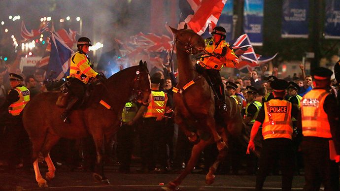 A police horse rears up as pro-union protestors clash with pro-independence protestors during a demonstration at George Square in Glasgow, Scotland September 19, 2014 (Reuters)