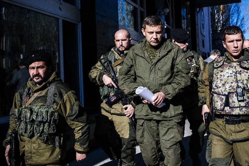 Pro-Russian rebel leader Alexander Zakharchenko, centre, surrounded by his security. 