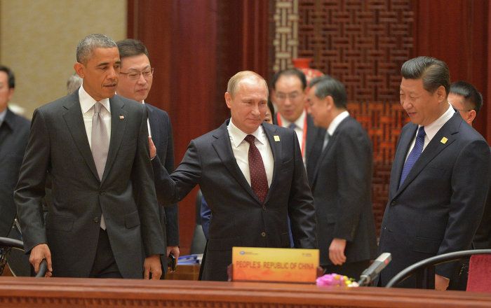 Russia's President Vladimir Putin, Chinese President Xi Jinping, his wife Peng Liyuan and U.S. President Barack Obama