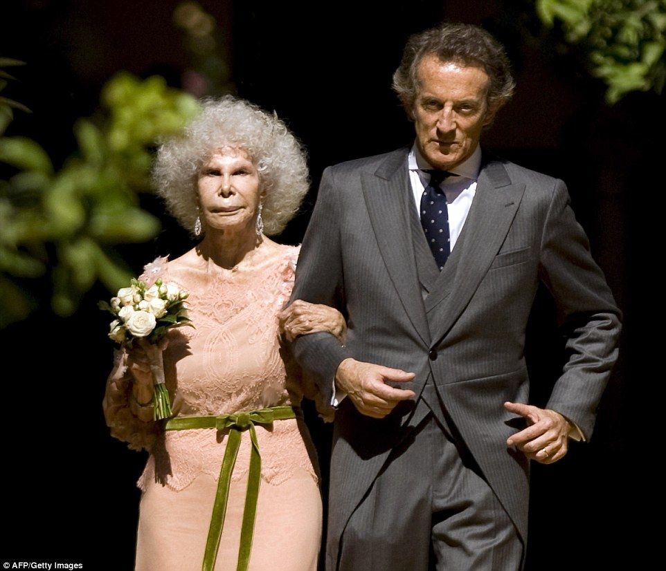 The Duchess and Alfonso Diez walk out of the chapel after their wedding in October 2011. It was the Spanish billionaire's third wedding  Read more: http://www.dailymail.co.uk/news/article-2842130/Spains-Duchess-Alba-Europes-richest-aristocrats-dies.html#ixzz3JhioumB0  Follow us: @MailOnline on Twitter | DailyMail on Facebook
