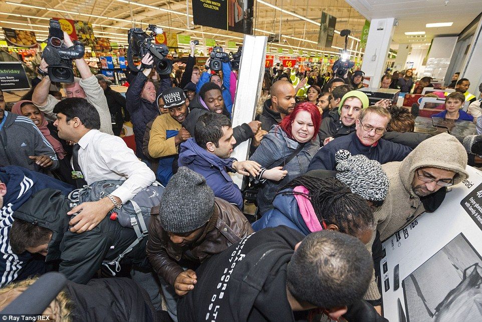 Shoppers scramble to get their hands on televisions, cooking appliances and other goods at Asda in Wembley, north London, this morning   Read more: http://www.dailymail.co.uk/news/article-2852585/Mayhem-Black-Friday-begins-Shoppers-clash-supermarkets-trying-grab-bargains-Boots-Game-Curry-s-PC-world-websites-crash-thousands-start-hunt-Christmas-deals.html#ixzz3KMg8bAhC  Follow us: @MailOnline on Twitter | DailyMail on Facebook