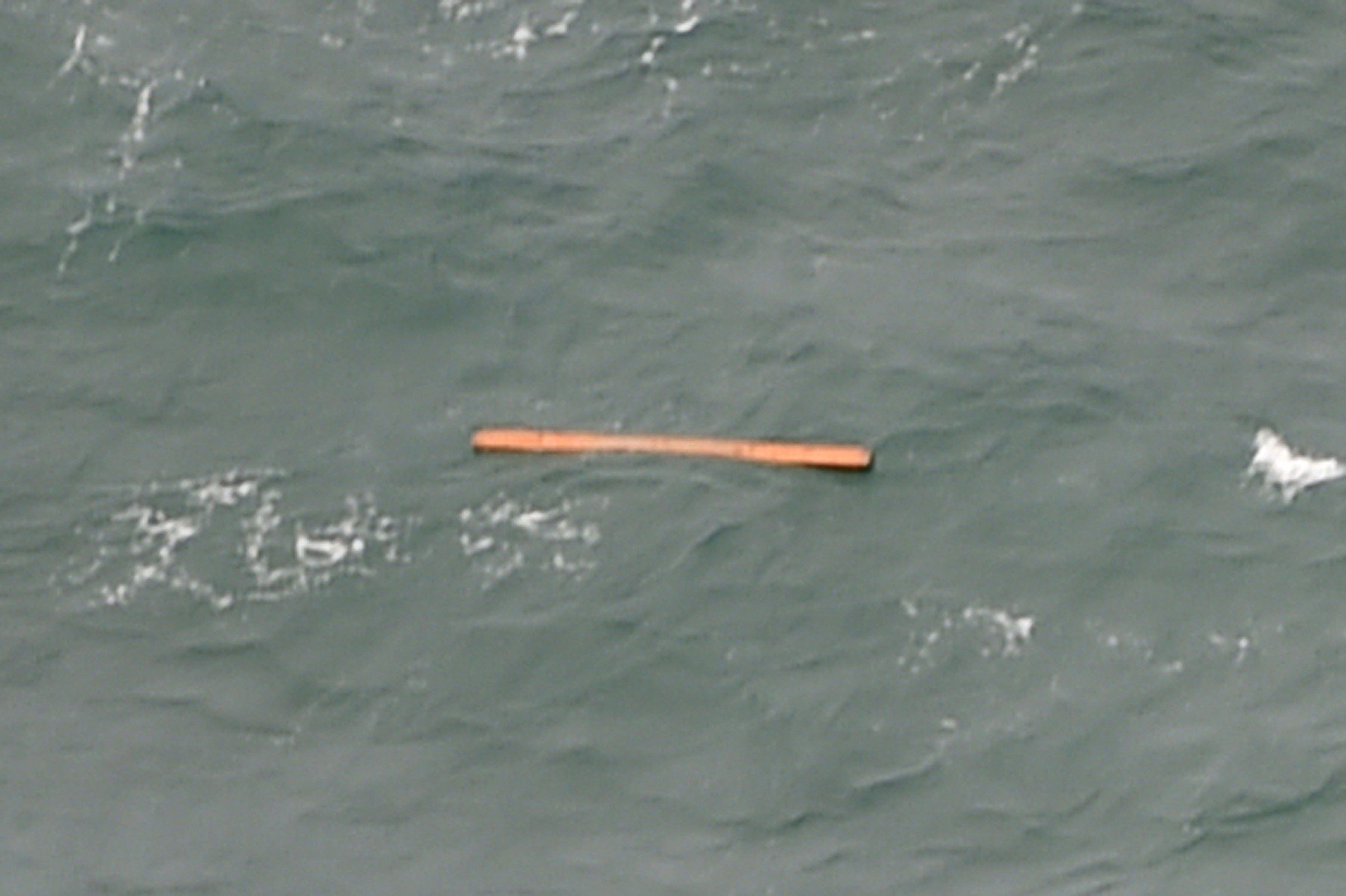 This aerial view taken from an Indonesian search and rescue aircraft over the Java Sea shows floating debris spotted in the search area. (AFP)