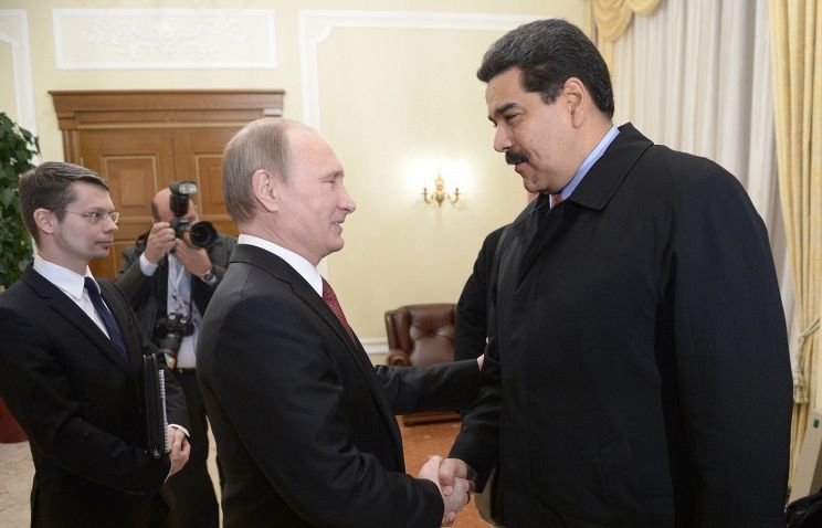 Vladimir Putin and Nicolas Maduro