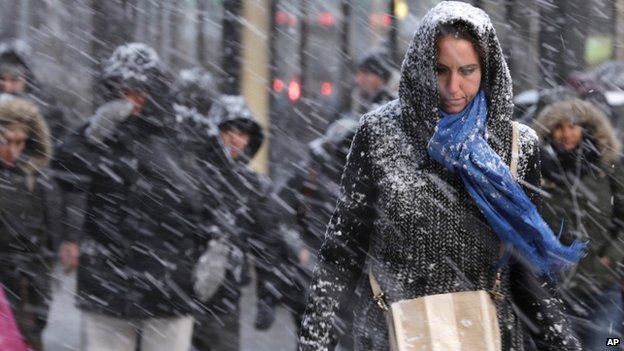 Pedestrians make their way through snow in New York This could be one of the biggest storms in New York City's history, meteorologists warn