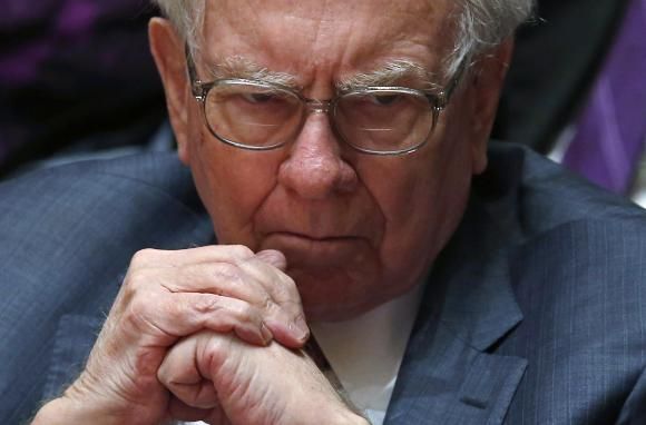 Financial investor Warren Buffett looks on during an announcement ceremony at Northwestern University in Evanston, Illinois, January 28, 2015.