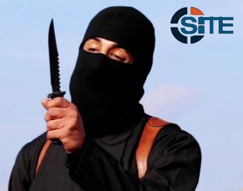 A masked, black-clad militant, who has been identified by the Washington Post newspaper as a Briton named Mohammed Emwazi, brandishes a knife in this still image from a 2014 video obtained from SITE